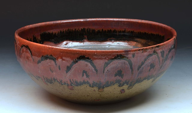 Appraisal: Artist UnknownBowl possibly attributable to Winchcombe Pottery kaki and tenmoku