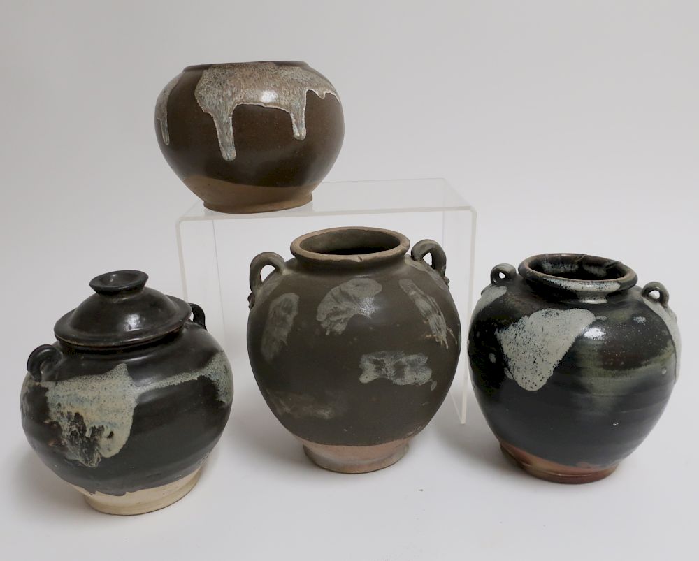 Appraisal: Four Tang Phosphatic Splash-Glazed Jars All jars are of squat