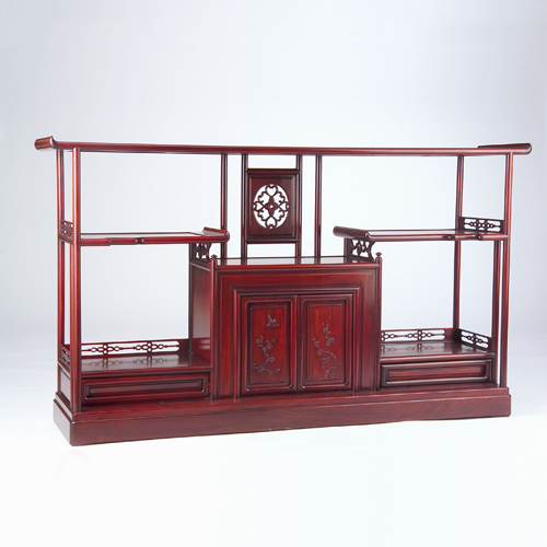 Appraisal: Chinese hardwood etagere with a central cupboard covered by hinged