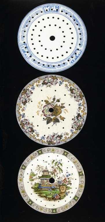 Appraisal: THREE DAVENPORT WEDGWOOD AND OTHER EARTHENWARE CIRCULAR DRAINERS transfer printed