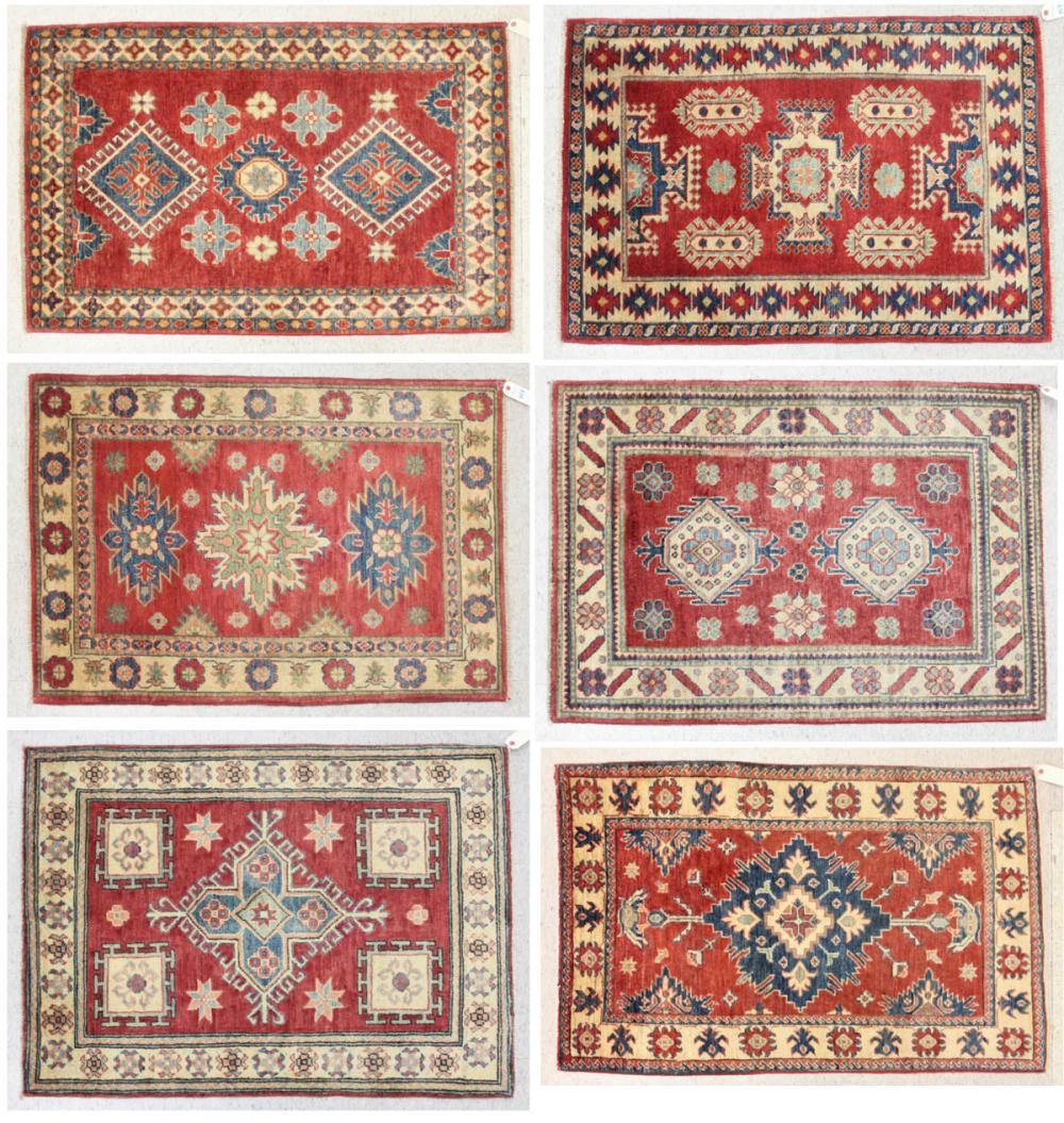 Appraisal: SIX HAND KNOTTED ORIENTAL AREA RUGS Pakistani-Persian geometric and stylized