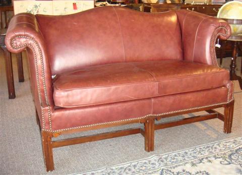 Appraisal: FAIRFIELD CHIPPENDALE STYLE BURGUNDY LEATHER LOVE SEAT h w d