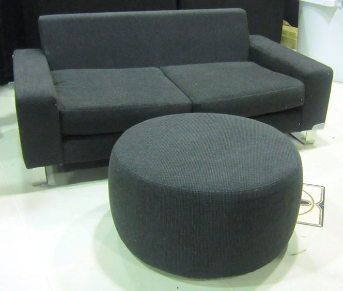 Appraisal: A TWO SEATER SOFA WITH FOOT STOOL A TWO SEATER