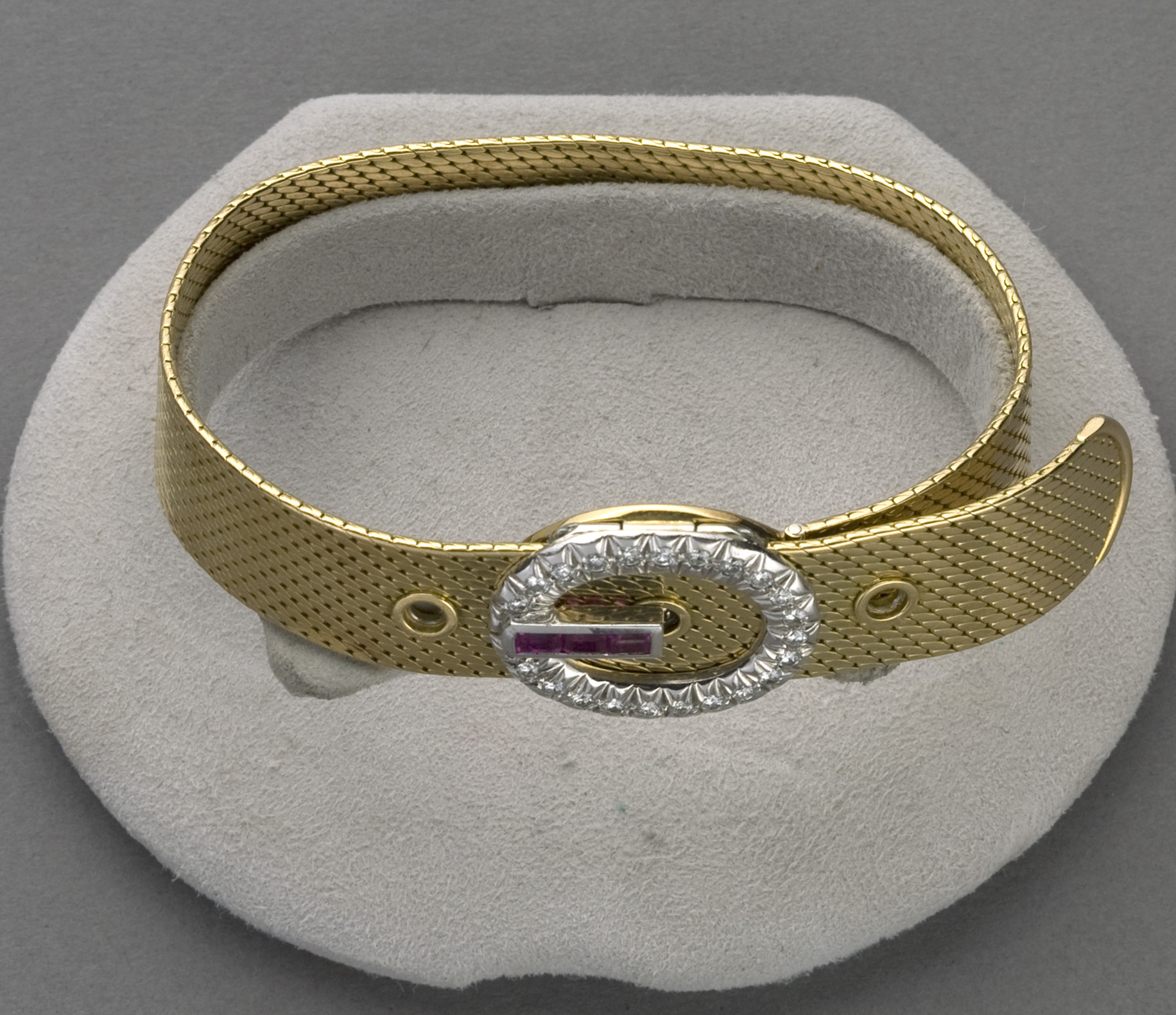 Appraisal: KT YELLOW GOLD BRACELET WITH RUBIES AND DIAMONDS The gold