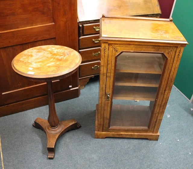 Appraisal: A VICTORIAN WALNUT MUSIC CABINET with glazed door and a