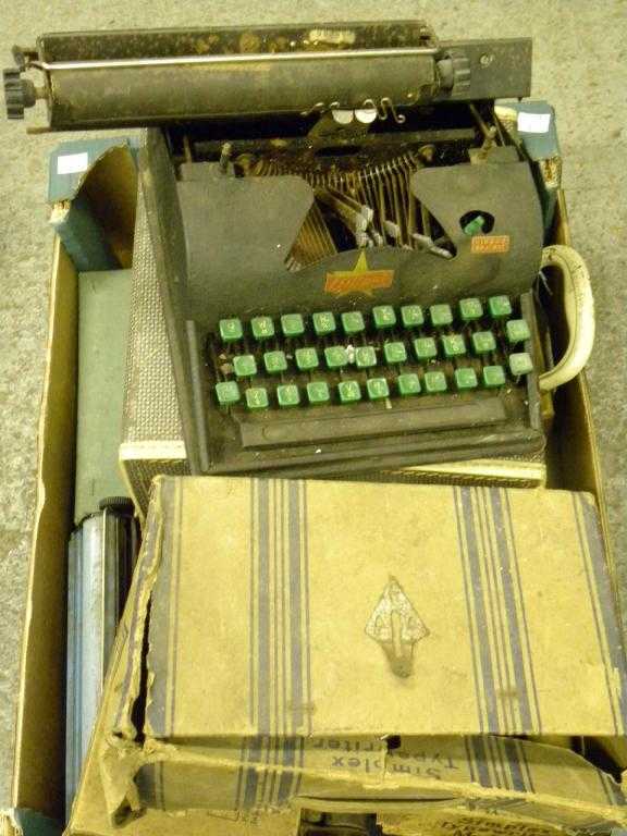 Appraisal: A child's tinplate Simplex typewriter lithographed in colour maker's card