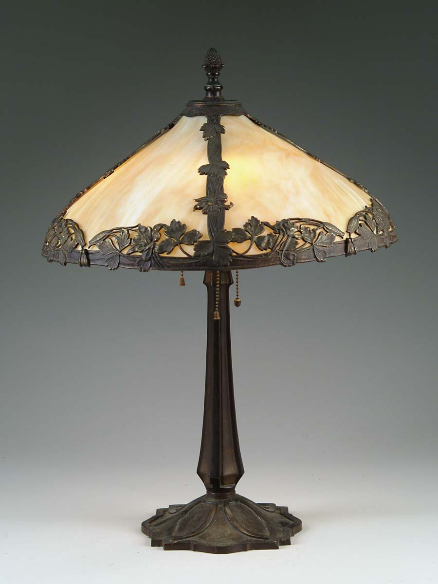 Appraisal: BENT PANEL TABLE LAMP Nice bent panel shade has cast