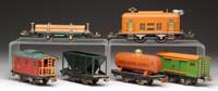 Appraisal: LIONEL O GAUGE LOCO FIVE FREIGHT CARS Loco in orange