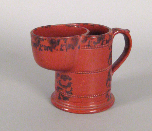 Appraisal: Redware shaving mug th c with manganese splash decoration and