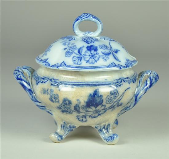 Appraisal: English Flow Blue Ironstone Sauce Tureen Late th Century Staining