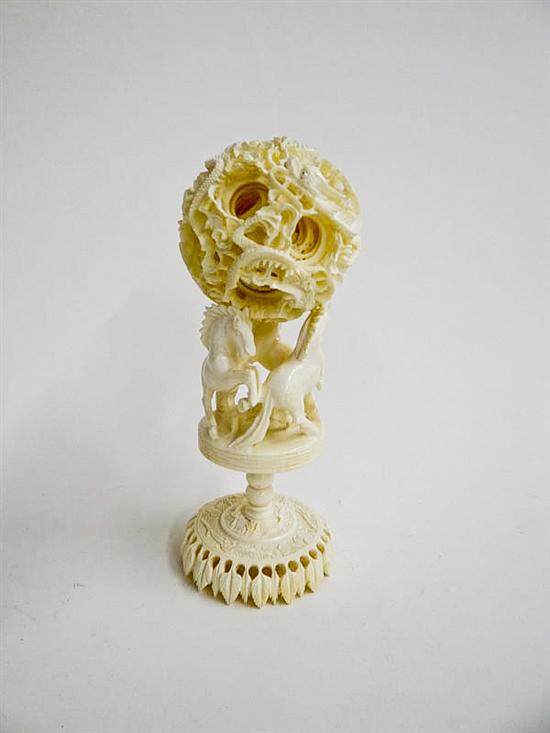 Appraisal: CARVED IVORY PUZZLE BALL ON STAND China st half- th