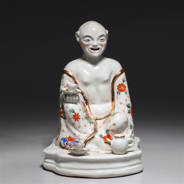 Appraisal: Chinese porcelain figure with gilt detail and floral pattern to