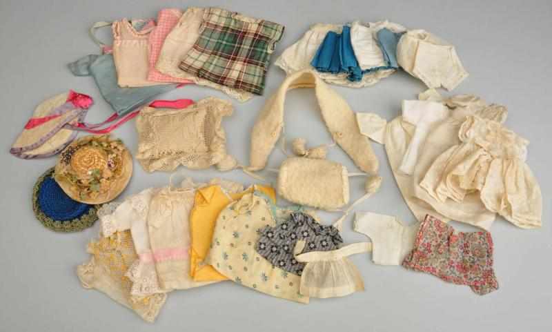 Appraisal: Lot of Vintage Clothes for Small Dolls Description Straw hat