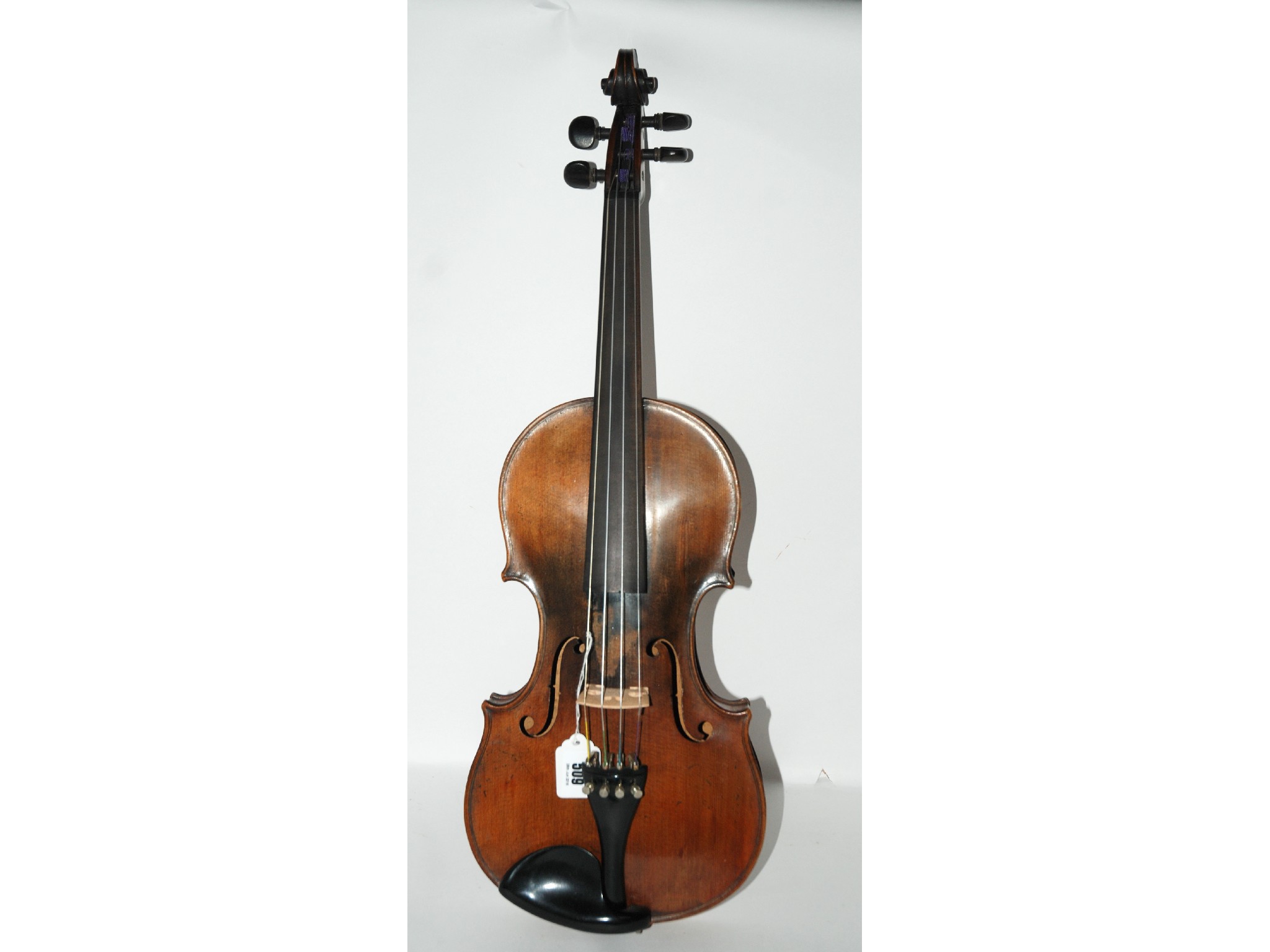 Appraisal: An early violin with label bow in wooden case and