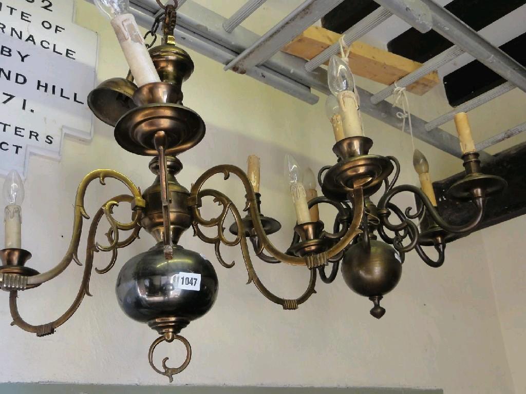 Appraisal: A Dutch style anodised six branch ceiling light with graduated