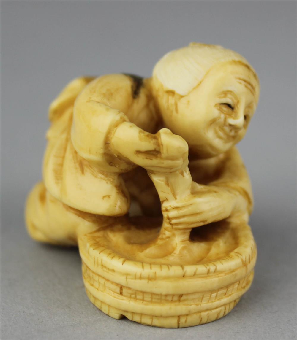 Appraisal: IVORY NETSUKE OF A WOMAN DOING LAUNDRY TH CENTURY SIGNED