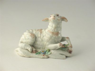 Appraisal: A Chelsea model of a recumbent sheep with its head