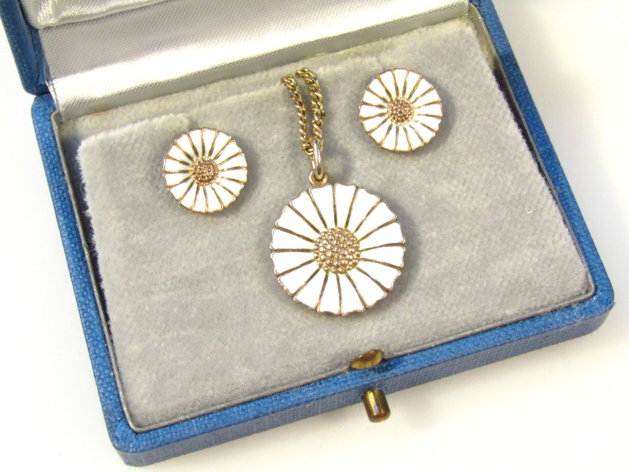 Appraisal: A George Jensen jewellery set enamel finish comprising ear studs