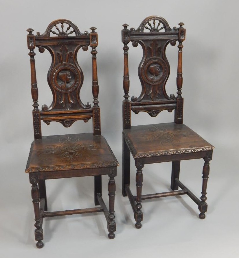 Appraisal: A pair of Victorian oak side chairs each with a