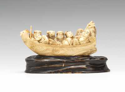 Appraisal: A Carved Ivory Figural of the Immortals in a Boat