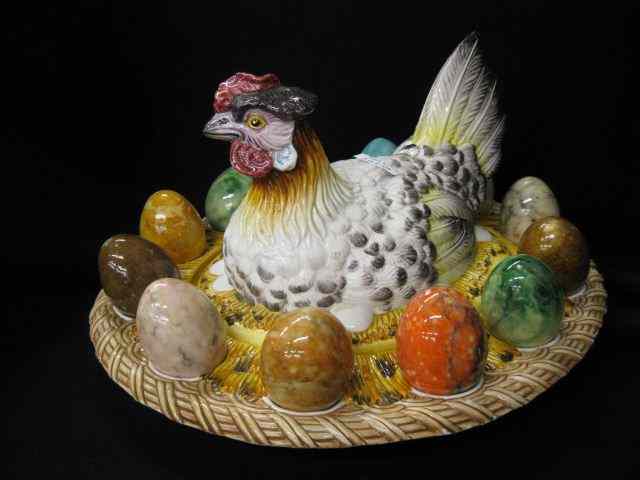 Appraisal: Figural Pottery Hen on Nest Covered Dish stone eggs around