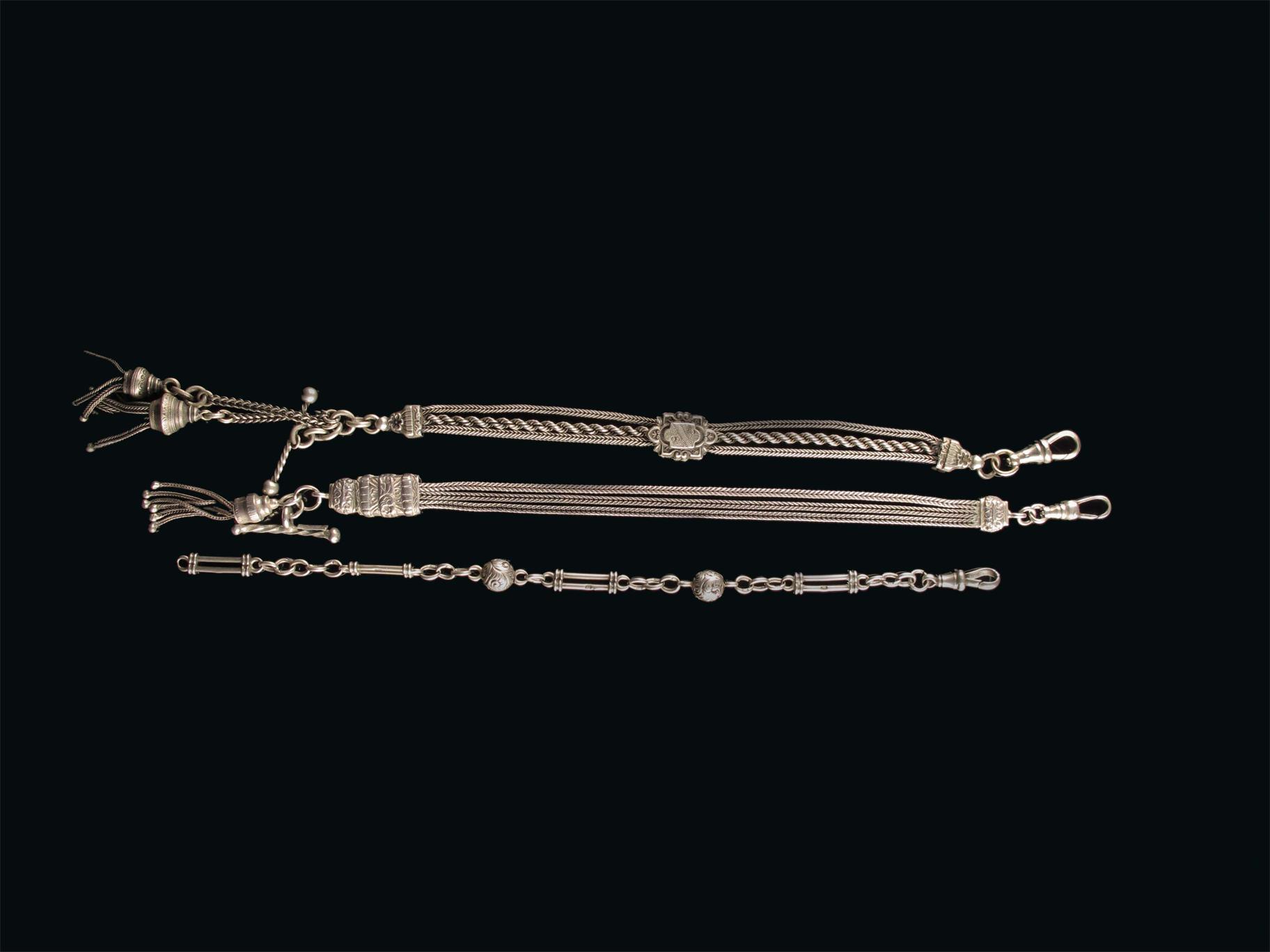 Appraisal: Three silver watch chains