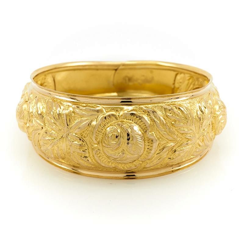 Appraisal: k Bas Relief yellow gold bangle bracelet k Yellow gold