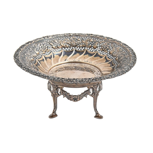 Appraisal: An Edwardian silver sweetmeat dish on detachable stand spirally lobed