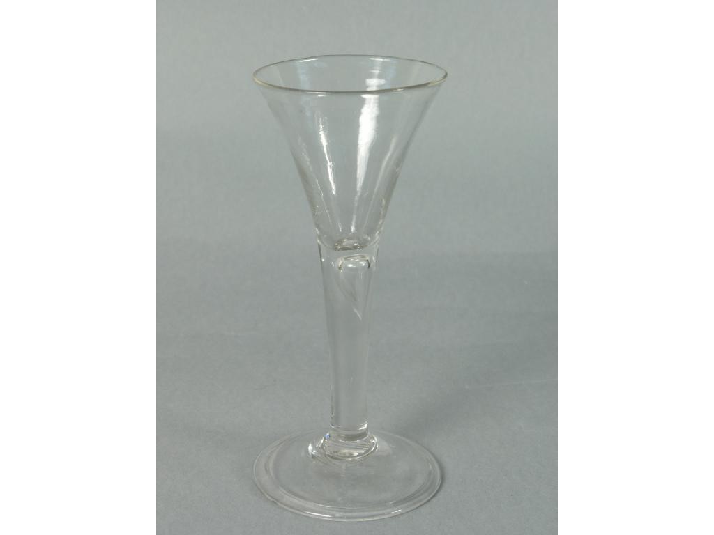 Appraisal: A mid th Century wine glass drawn trumpet type with