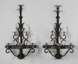 Appraisal: Wrought iron Pair of contemporary wrought iron -light wall sconces