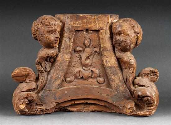 Appraisal: Continental probably Italian carved wood embellishment th century seraphim figures