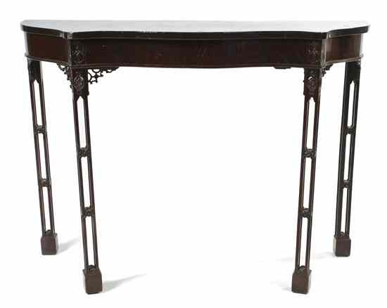 Appraisal: A Georgian Style Mahogany Console Table having a serpentine front