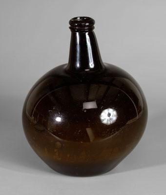 Appraisal: th century black glass bottle globular form with tapered neck