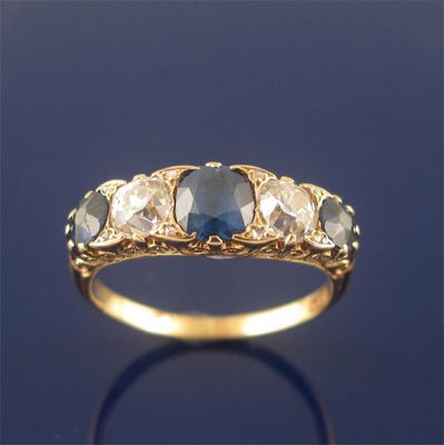 Appraisal: A sapphire and diamond five stone ring the three oval