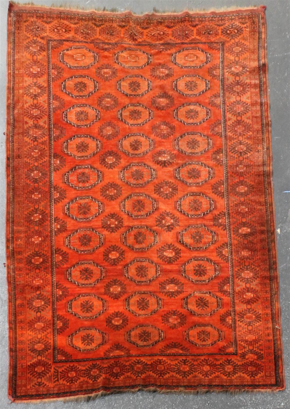 Appraisal: BESHIR KAZAKISTAN WOOL RUG having a deep brown-red field with