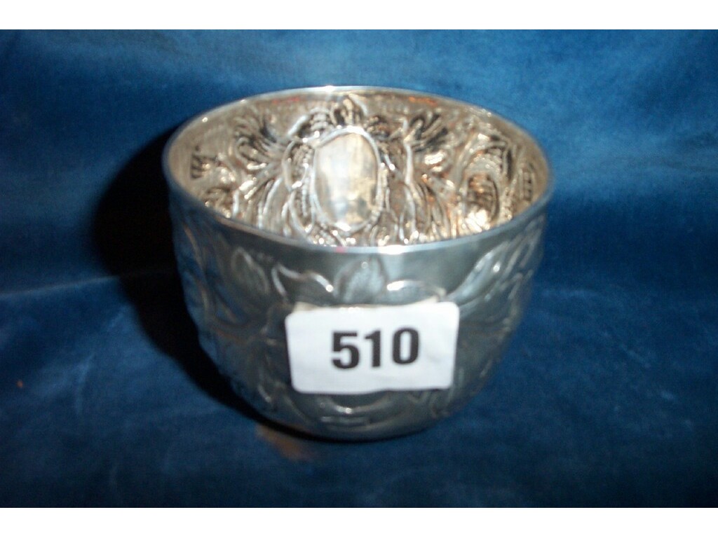 Appraisal: A th century silver tumbler cup with profuse embossed floral