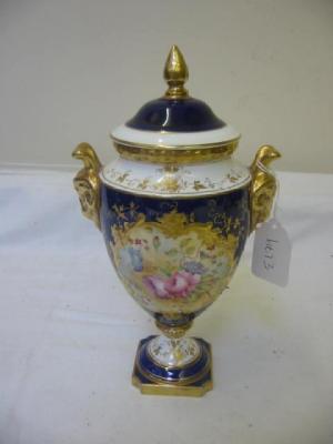 Appraisal: A COALPORT PORCELAIN LIDDED VASE of urn form painted with