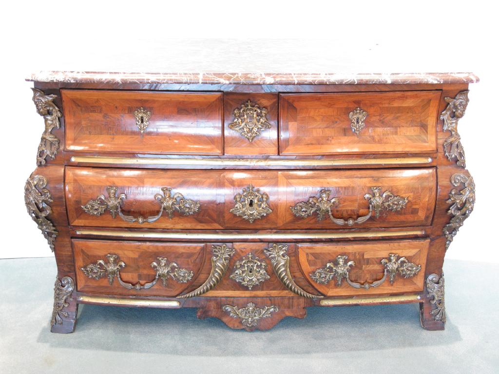 Appraisal: A Louis XIV Regency Commode of bombe form in kingwood