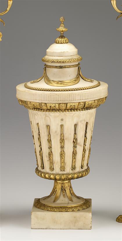 Appraisal: Louis XVI gilt bronze mounted white marble covered urn The