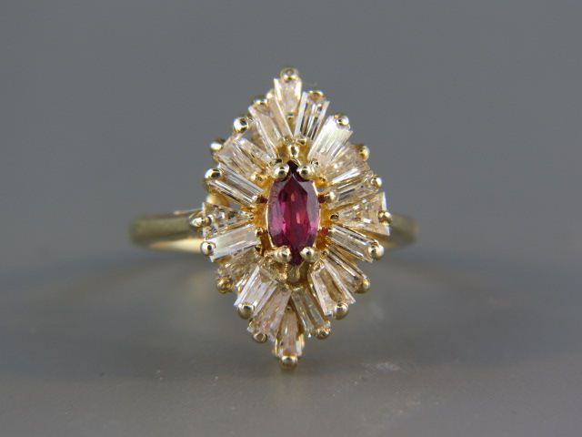 Appraisal: Ruby Diamond Ring marquise cut gem weighing carat surrounded by