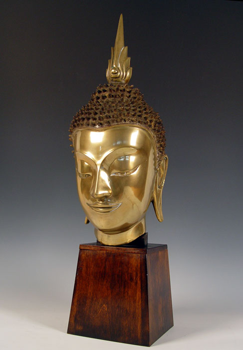 Appraisal: LARGE BRASS BUDDHA HEAD SCULPTURE On wood base ''h overall