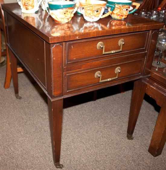 Appraisal: Pair of Regency style banded mahogany two-drawer side tables Estimate