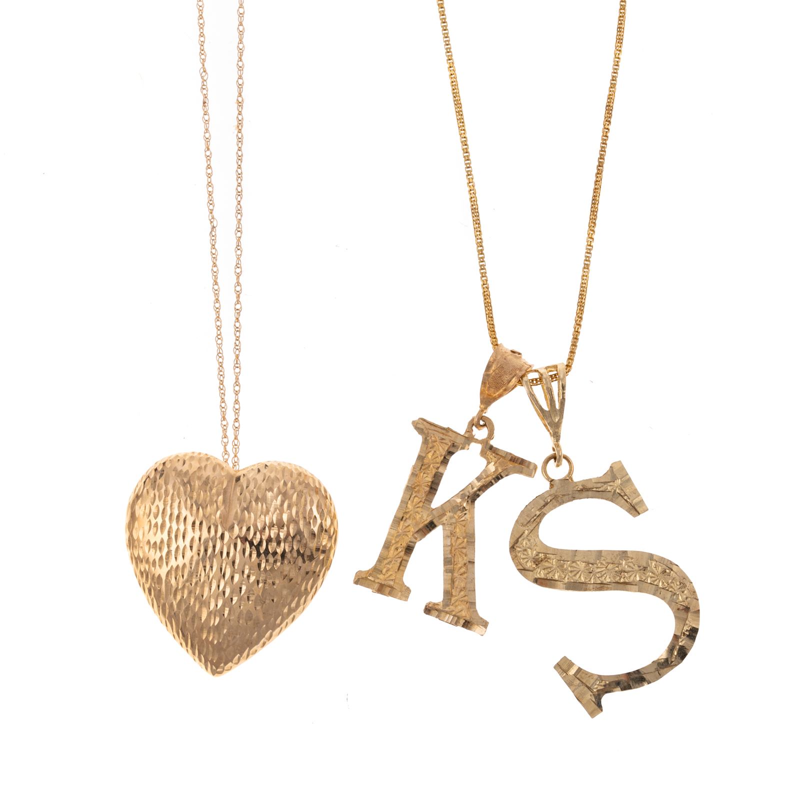 Appraisal: A COLLECTION OF CHAINS PENDANTS IN K GOLD Two K