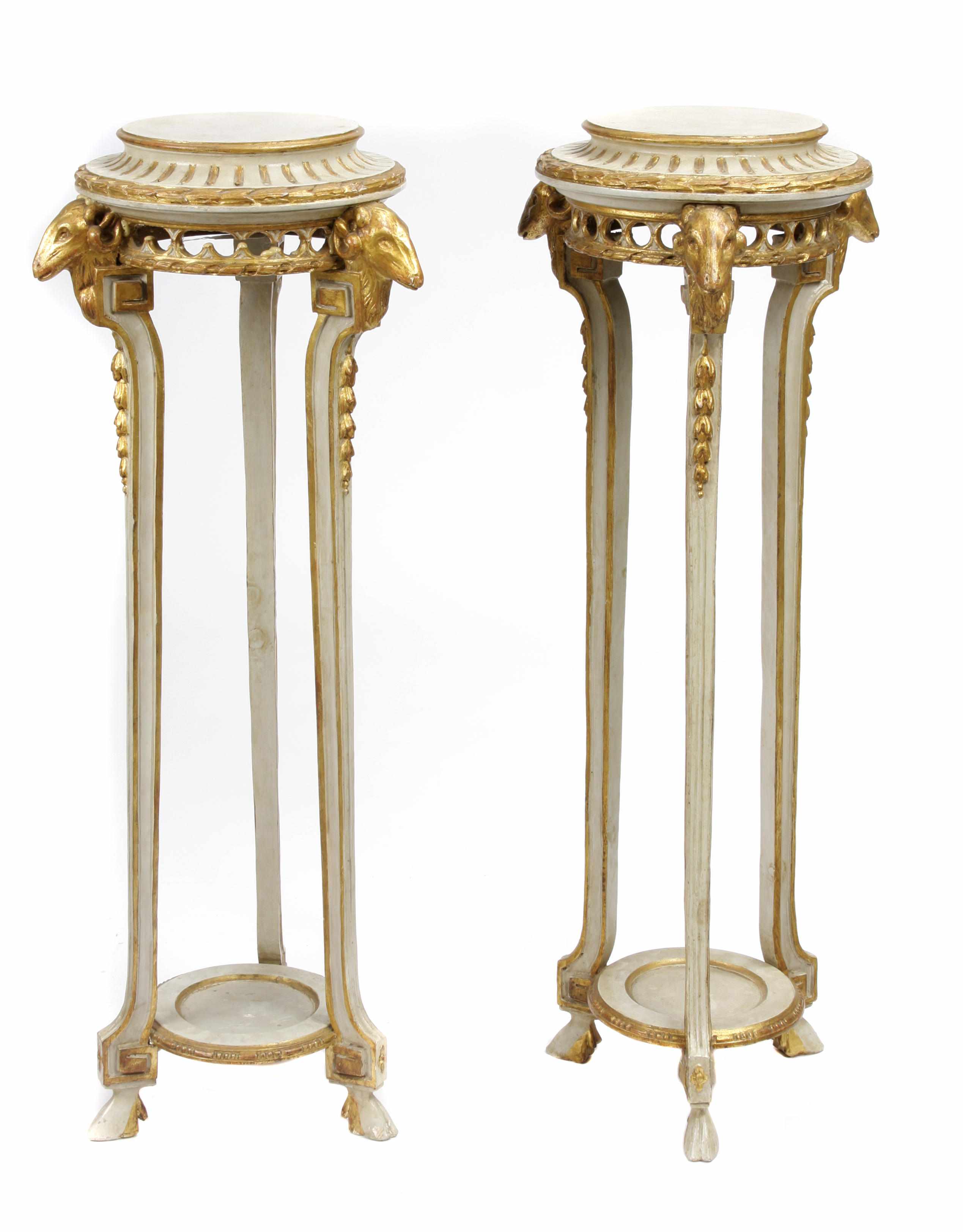 Appraisal: A pair of Regency style parcel gilt paint decorated plant