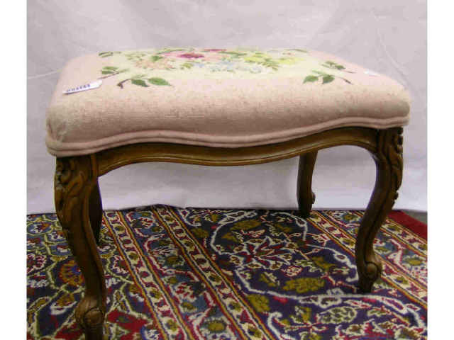 Appraisal: French style carved leg footstool with floral needlepoint upholstery