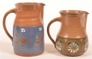 Appraisal: Two Hay Creek Pottery Floral Pitchers Two Hay Creek Pottery