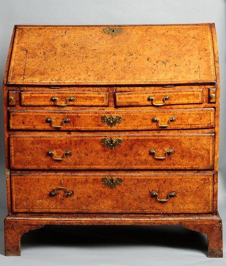 Appraisal: A George III burr elm bureau circa the banded fall