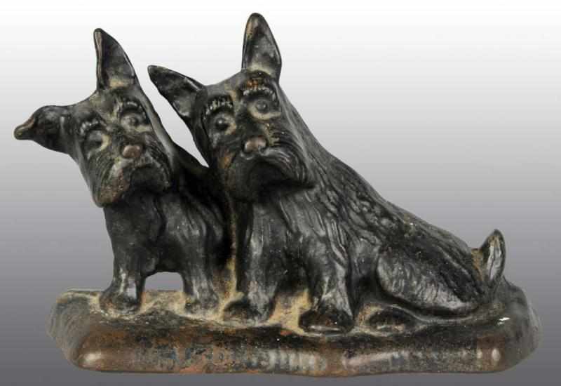 Appraisal: Cast Iron Twin Scotties Doorstop Description Texaco Scotties numbered Condition