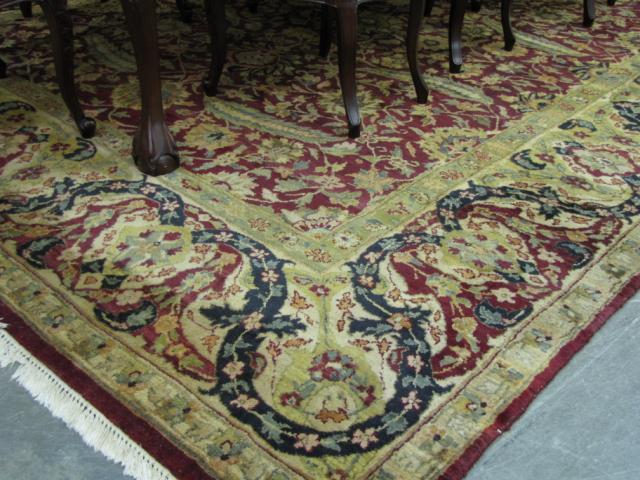 Appraisal: Persian design India-made wool rug maroon and gold tone '