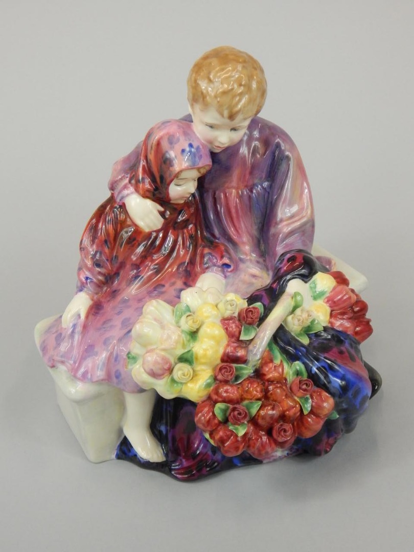 Appraisal: A Royal Doulton figure Flower Seller's Children HN green printed